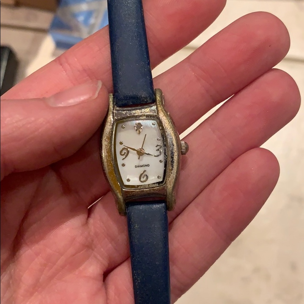 Vintage blue leather Avon watch